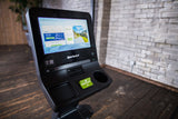 SportsArt C576R-16″ Status Recumbent Cycle – ECO-NATURAL with 16″ SENZA™ Touchscreen
