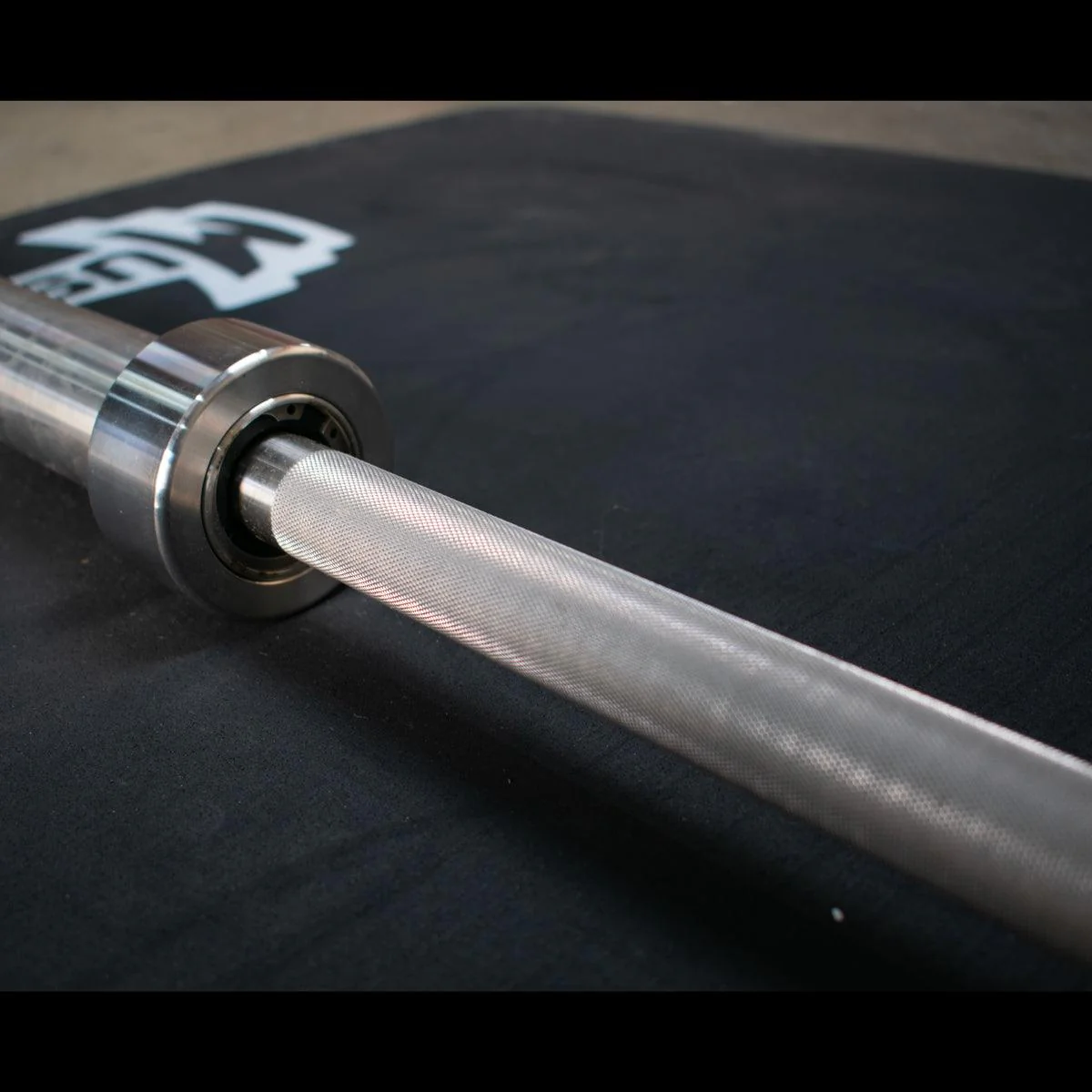 7' Stainless Steel Olympic Bar - Bearing - Muscle D Fitness - Qualiity Knurling